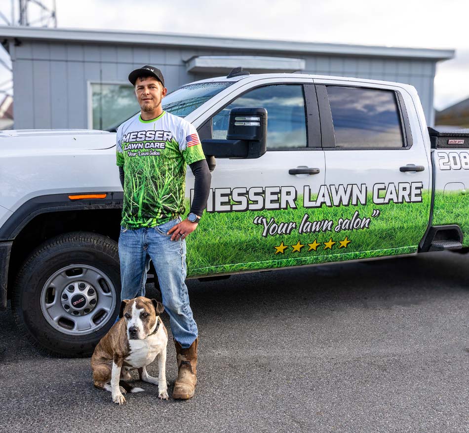 Messer-Lawn-Care-Dylan-Messer-About Messer Lawn Care Local Team CDA owners standing in front of trailer